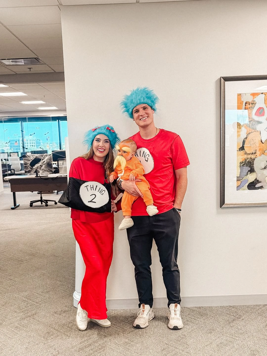 Family in red black and blue wig Halloween costume looks