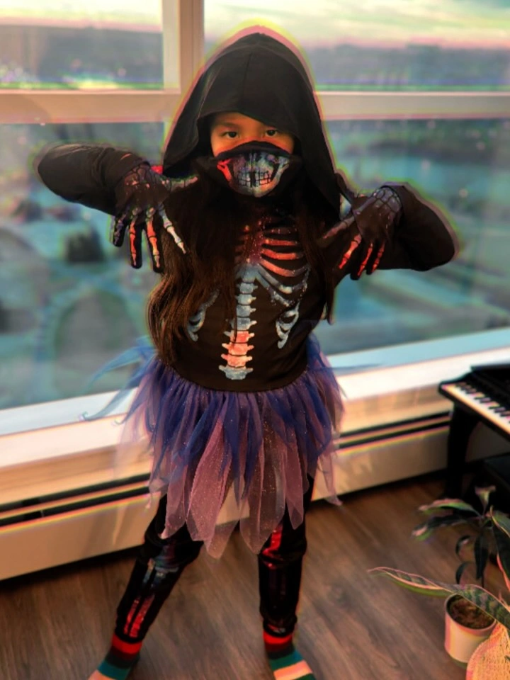 Hooded skeleton costume with purple red tulle skirt gloves leggings and boots