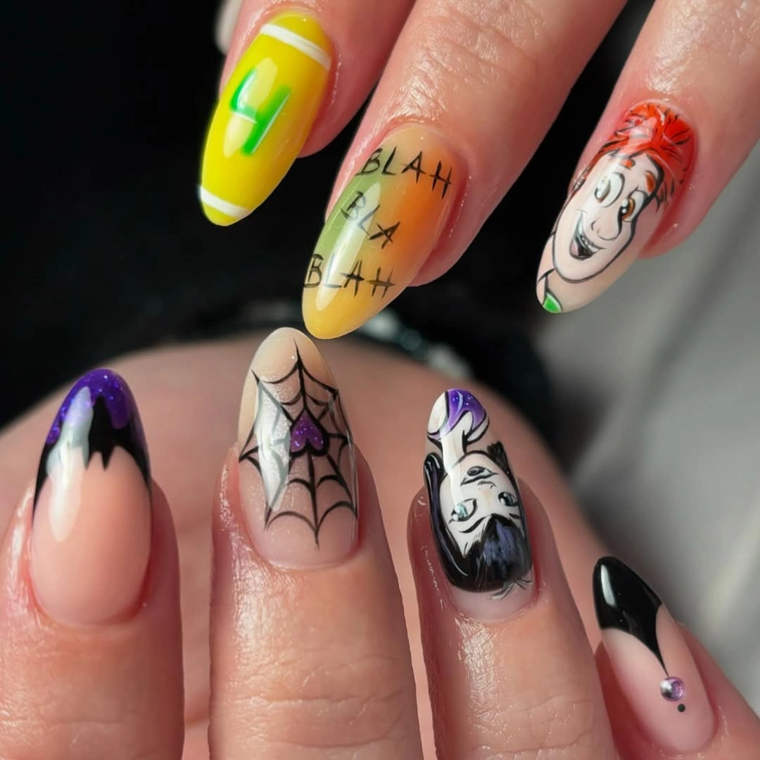 Medium pastel nails with ghosts webs moons and Halloween accents