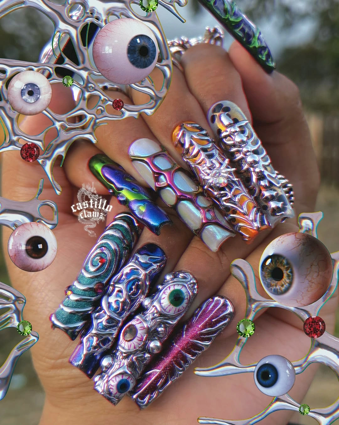 Very long coffin nails with colorful 3D eye and metallic details