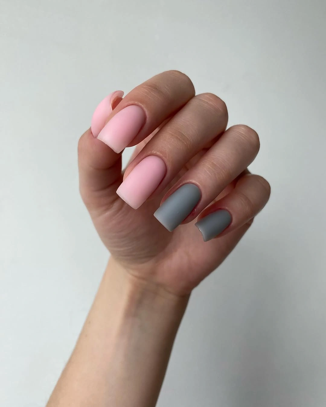 Long square matte nails alternating soft pink and medium gray colors