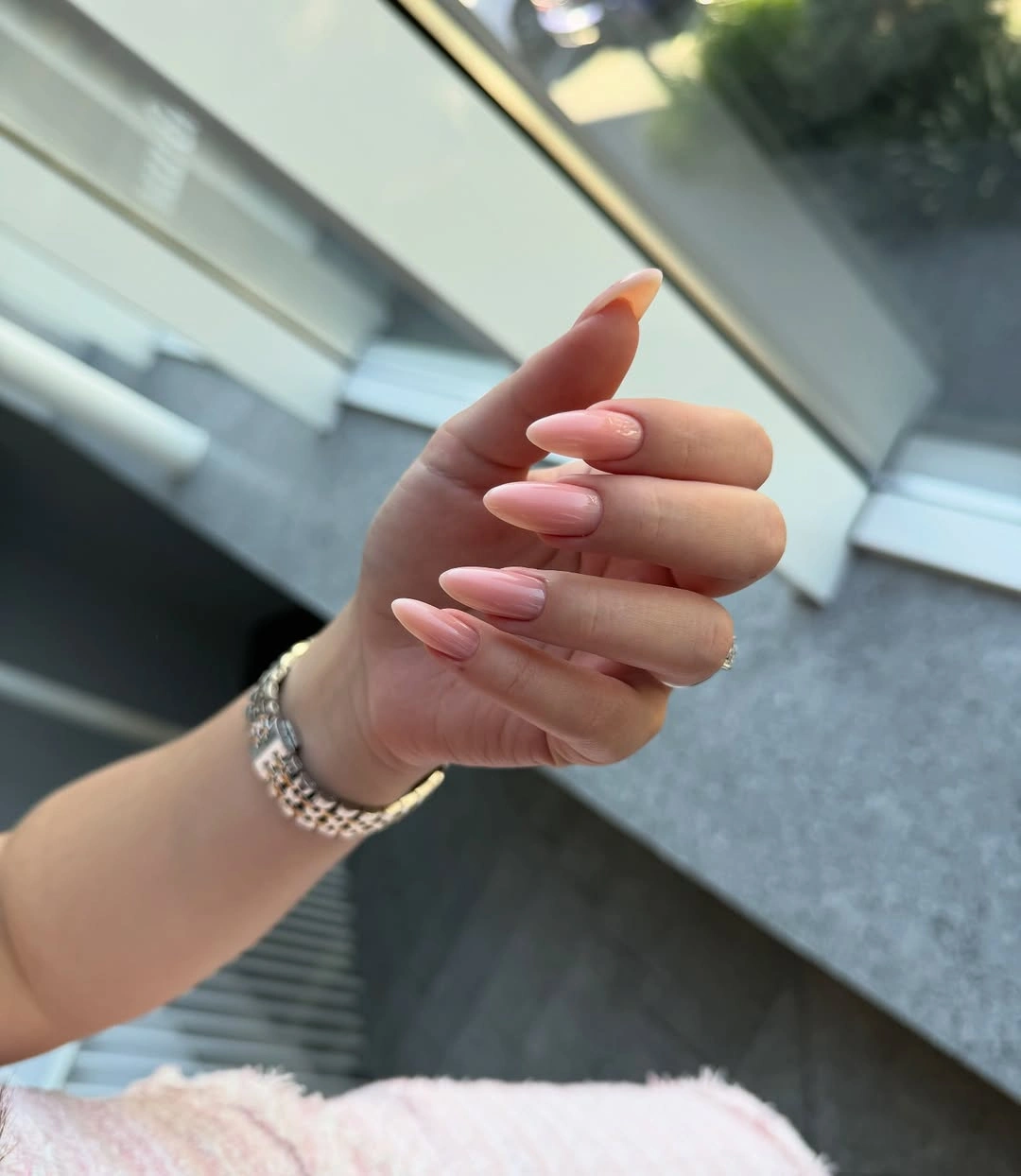 Long almond nails in soft glossy blush pink