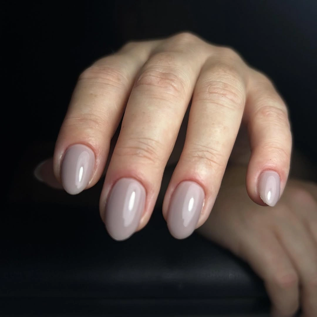 Short oval nails in smooth milky nude gloss