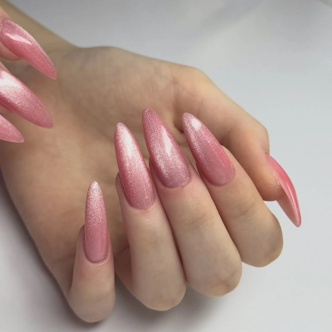 Long almond nails in reflective rose pink shimmer