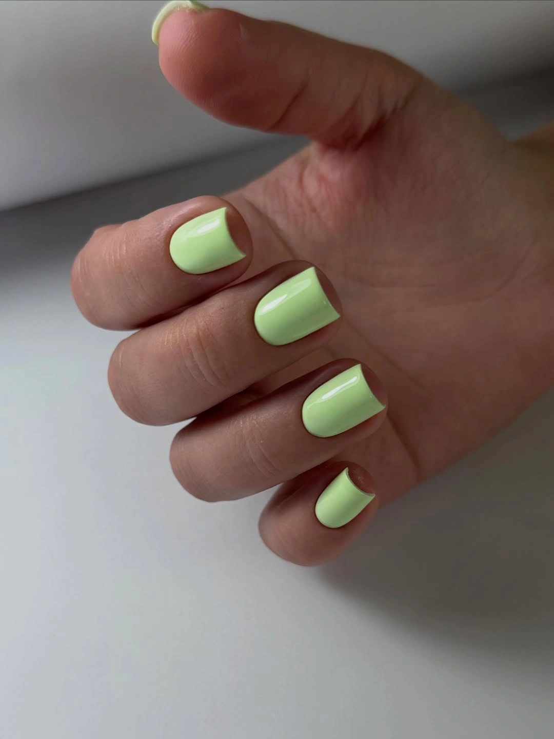 Pastel mint green short rounded-square nails