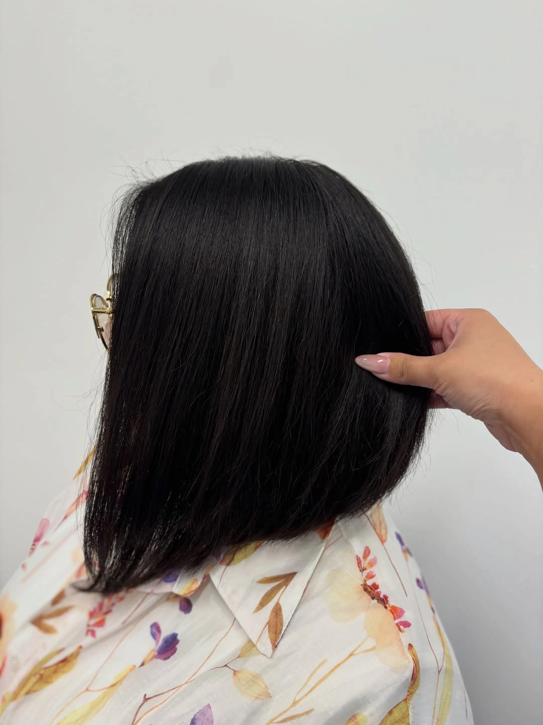 Dark shoulder-skimming bob with lifted uneven ends