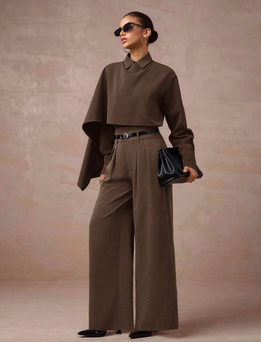 Belted brown cape-style top with matching wide trousers