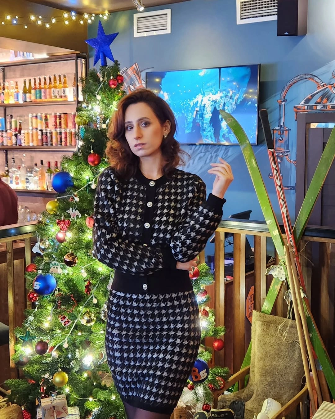 Black and white patterned knit cardigan with matching skirt