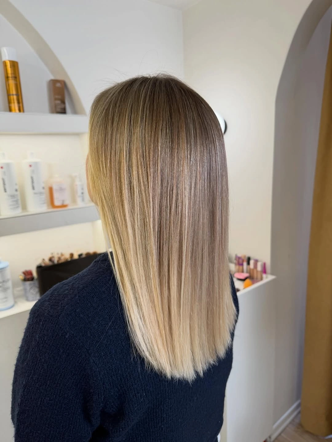 Straight long bob with dark crown and beige blonde pieces