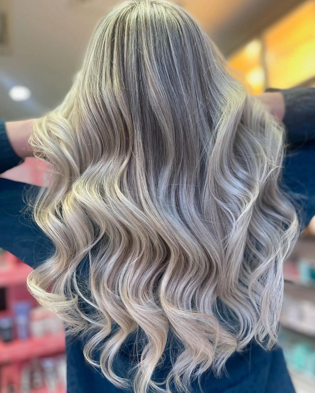 Long pale blonde hair with defined repeating waves
