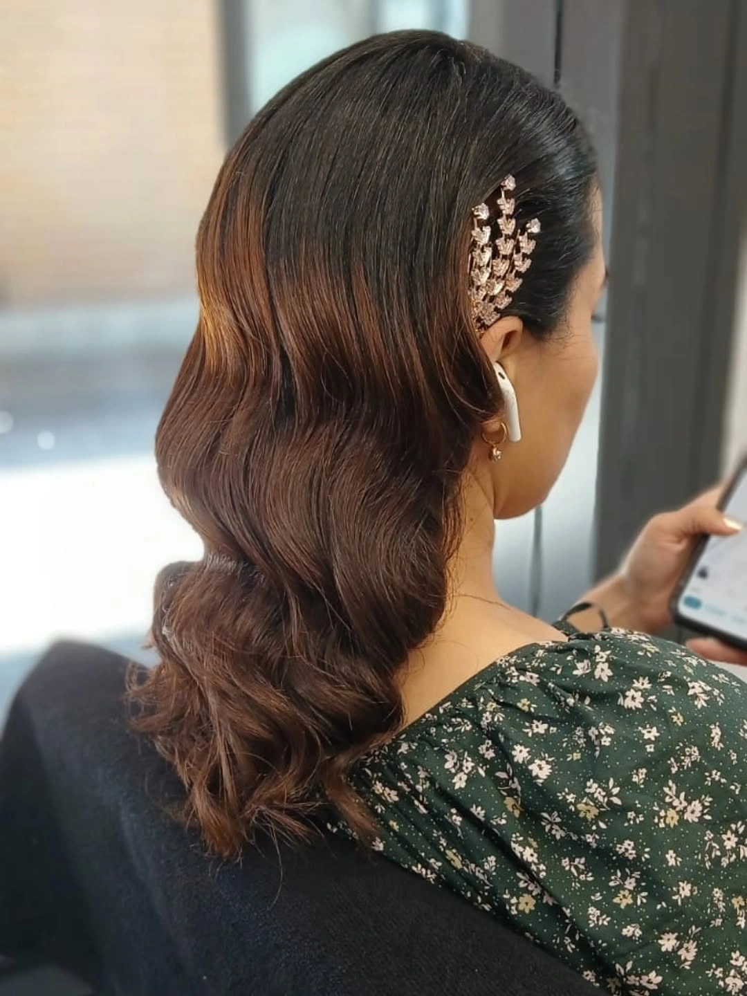 Dark glossy waves with sparkling branch-shaped side clip