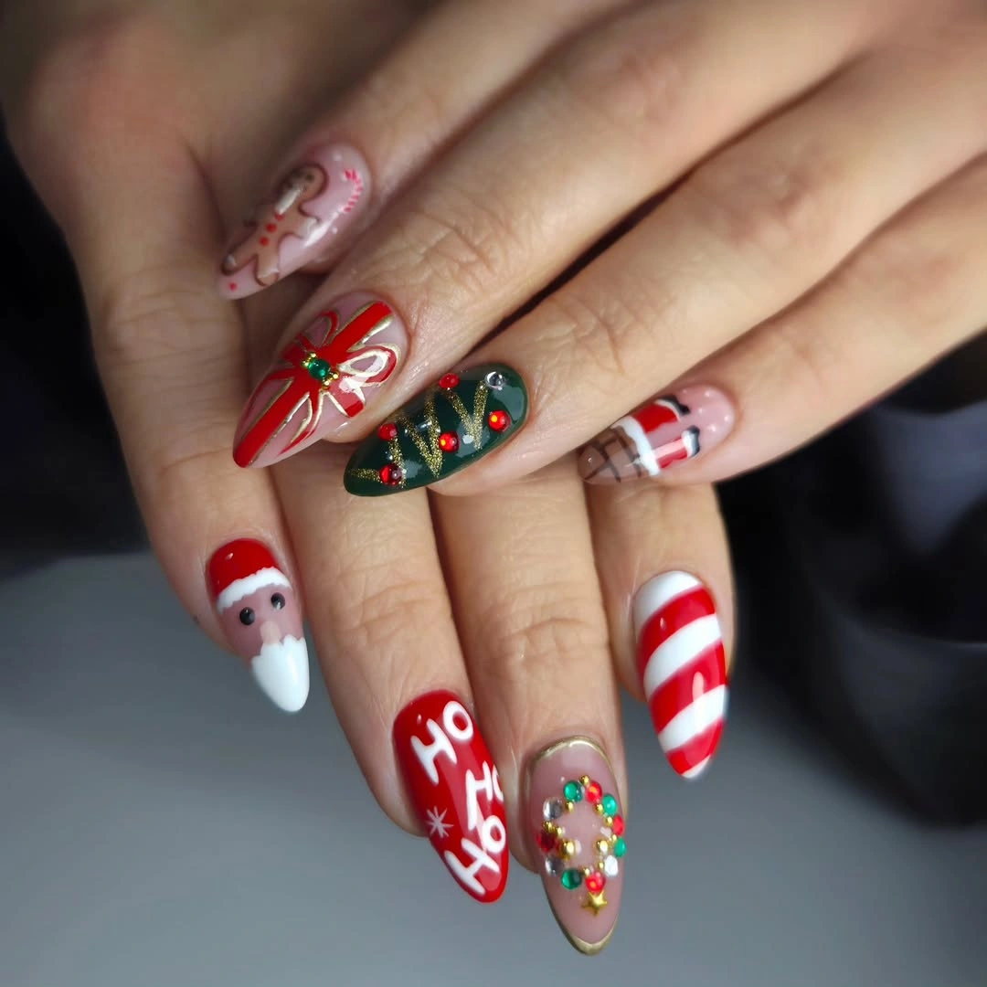 Long almond nails with Santa, candy stripes, tree, and gift motifs