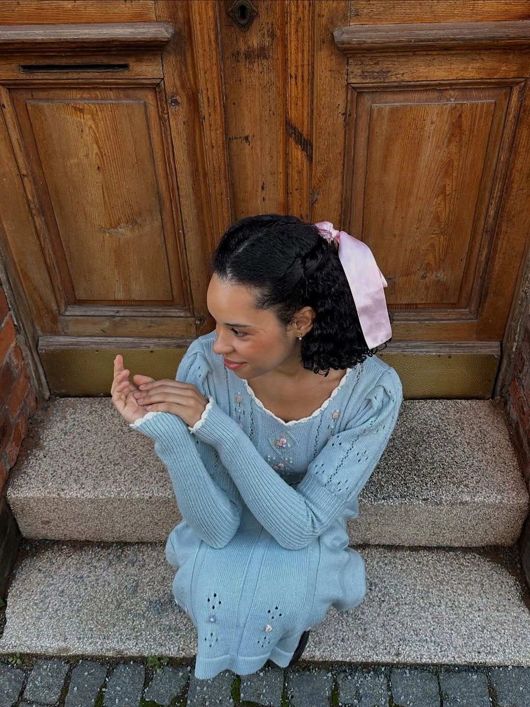 Pale blue mini dress with pink ribbon and matching arm pieces