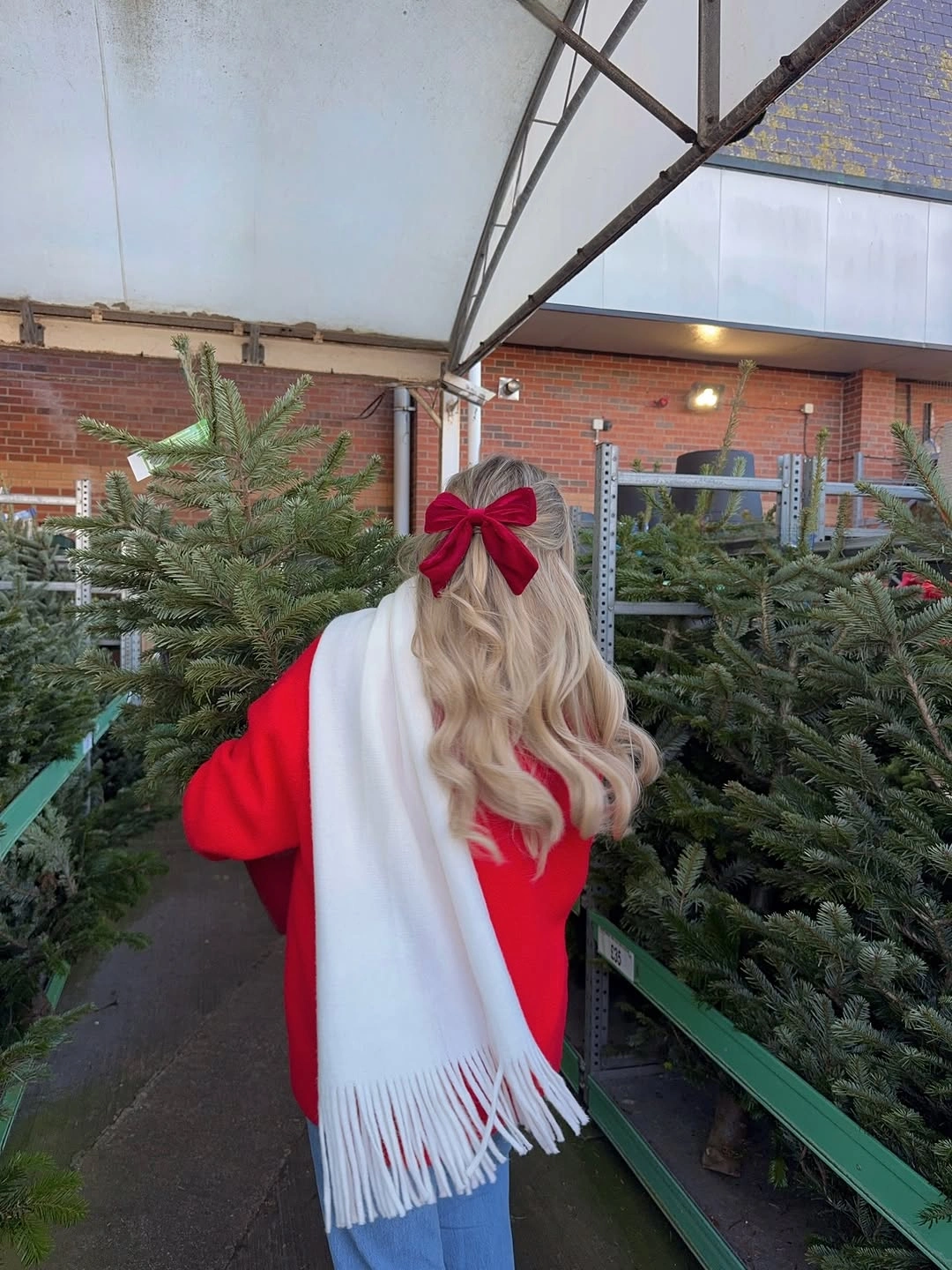Red oversized top with white scarf and large hair bow