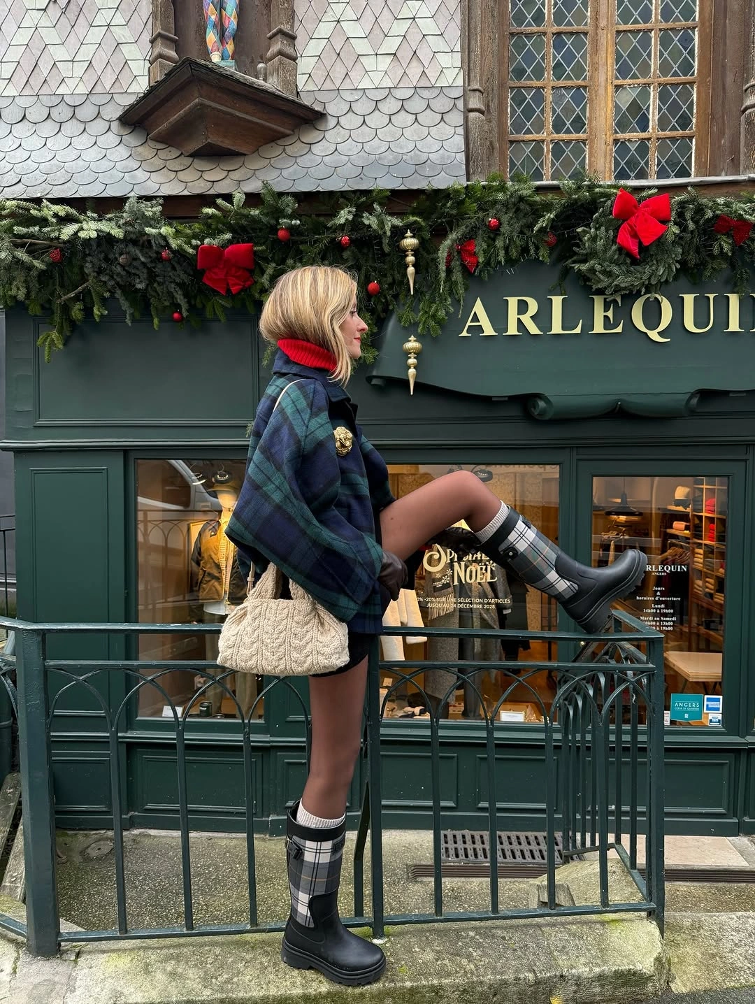 Oversized plaid outer layer with checked socks and black boots
