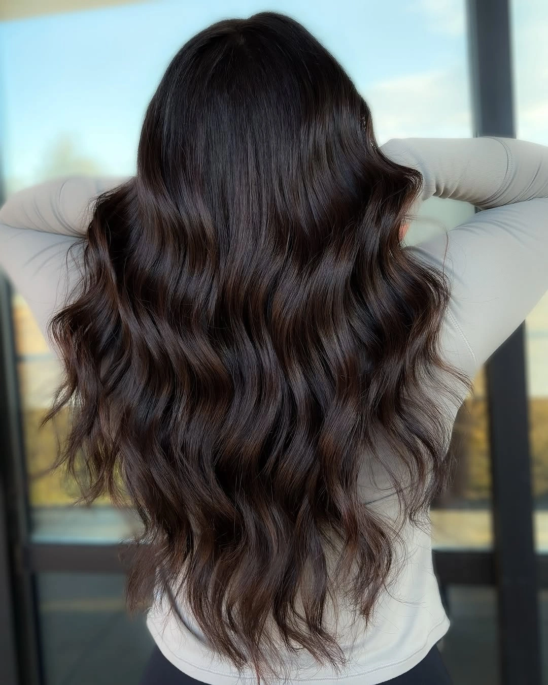 Long dark brunette waves with subtle brown shine