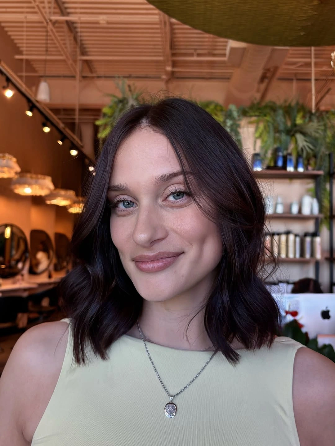 Short wavy brunette bob with deep burgundy-brown shine