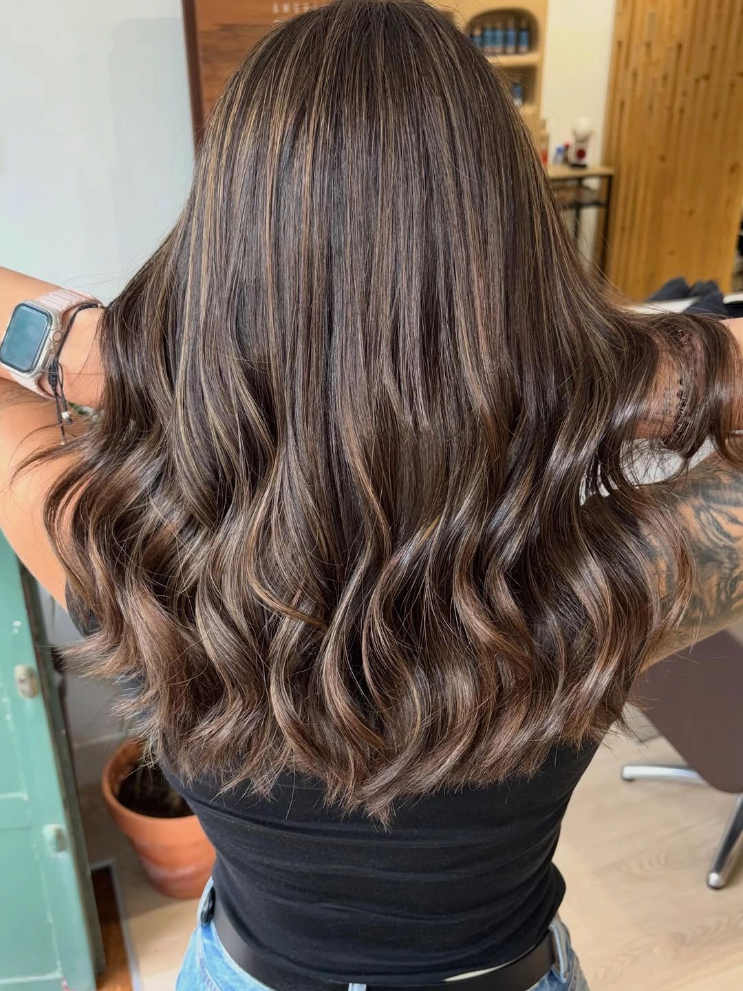 Back view of brunette waves with dense caramel ribbons