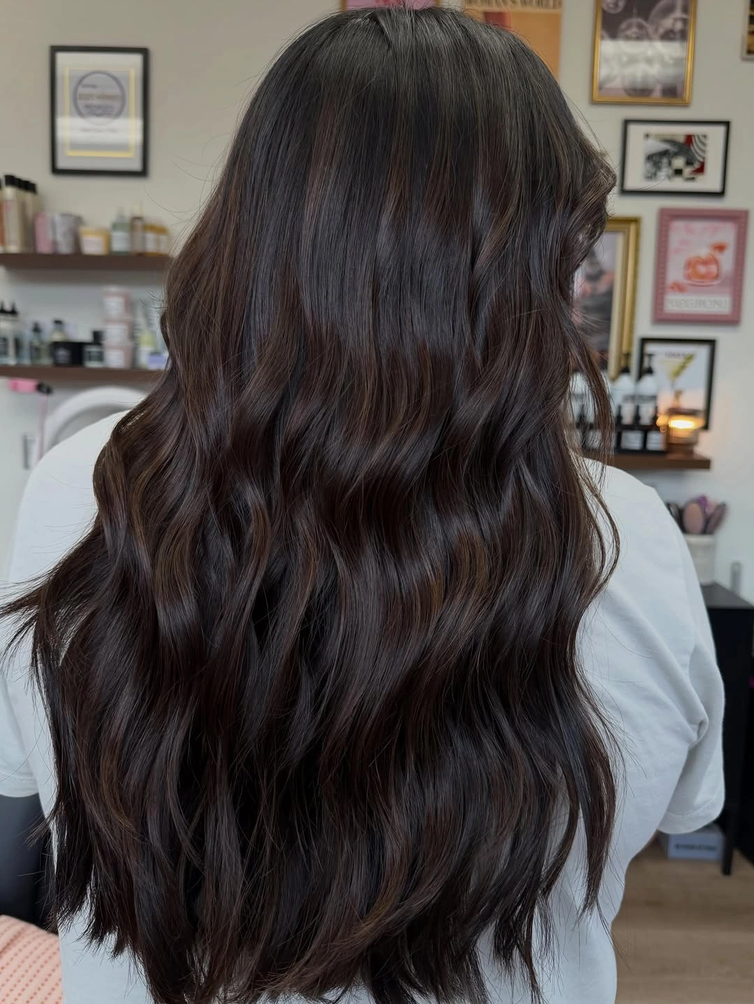 Long dark brunette waves with faint burgundy shine