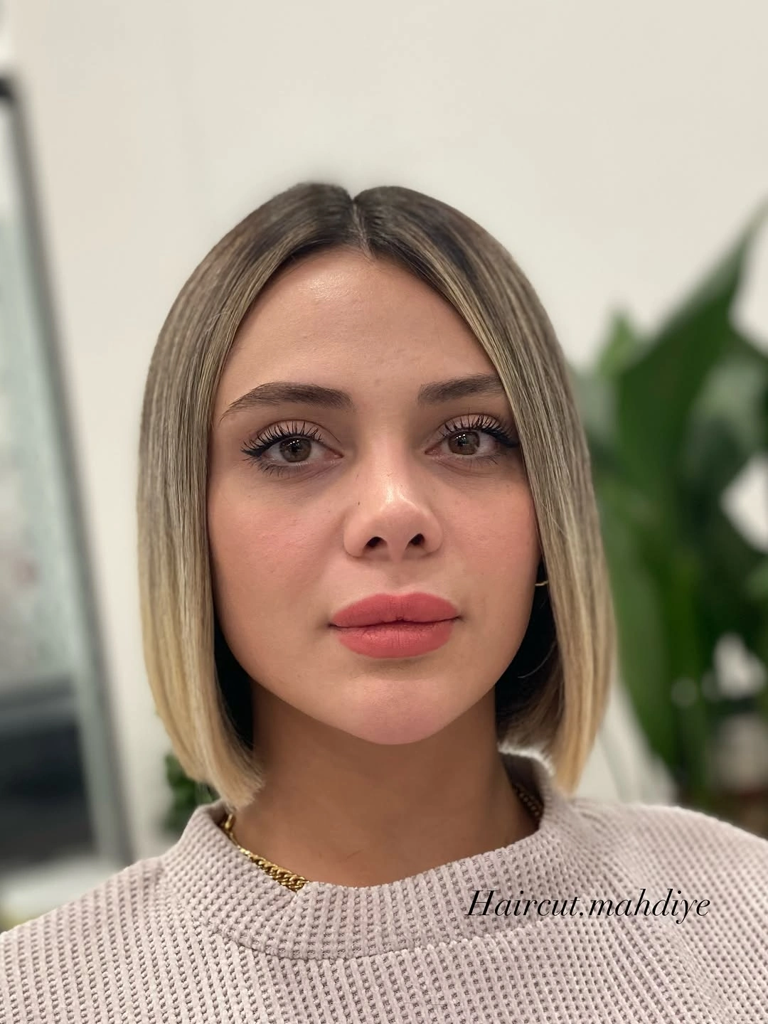 Short center-part bob with blonde face panels