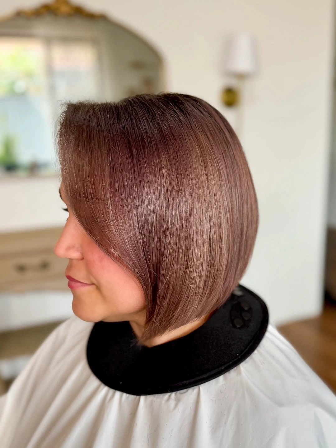 Copper angled bob with side part and longer front