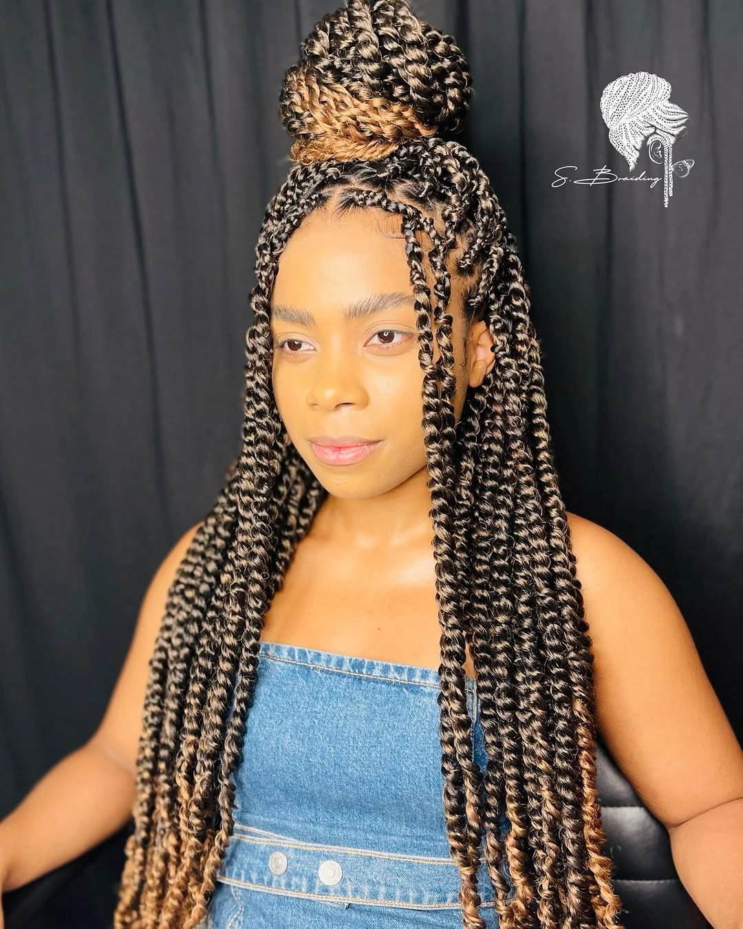 Small braids gathered high with long front pieces