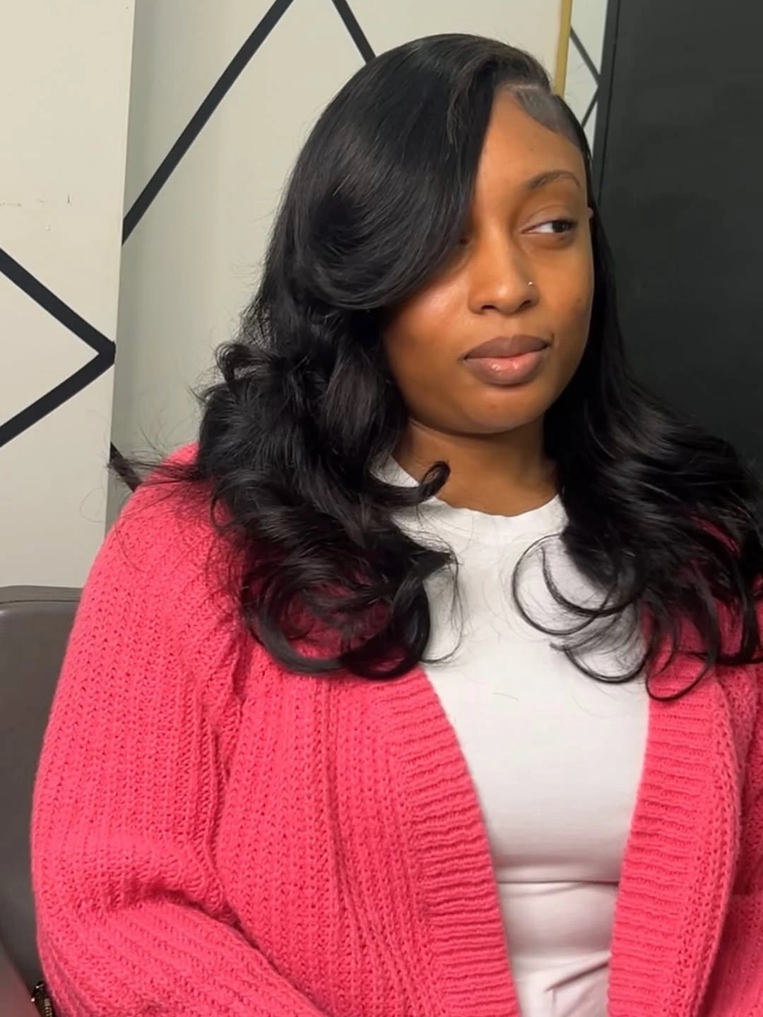 Long glossy black waves with deep side part