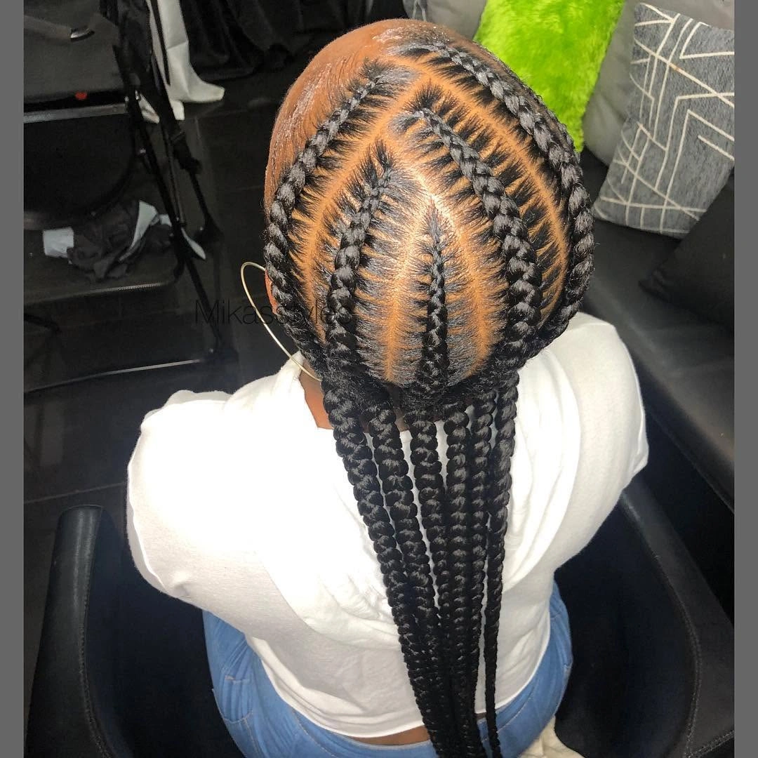 Straight cornrow-like rows leading into long hanging braids