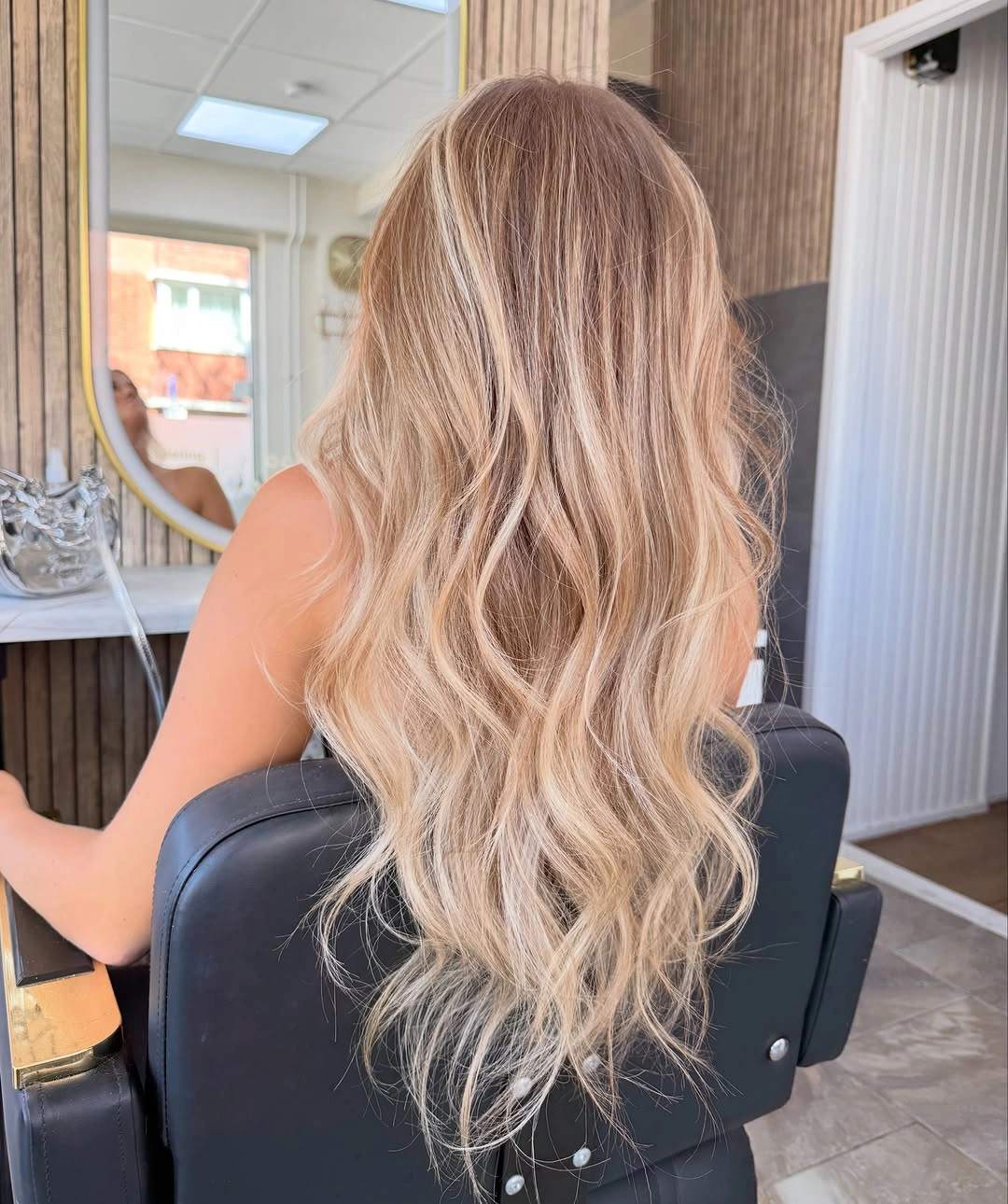 Long pale blonde waves with softly blended lengths