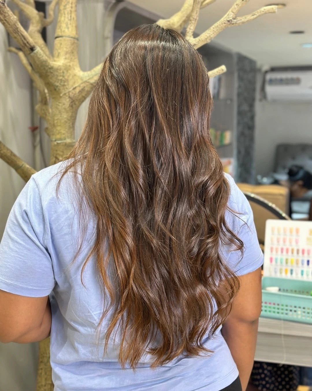 Long medium brown waves with lighter-looking pieces