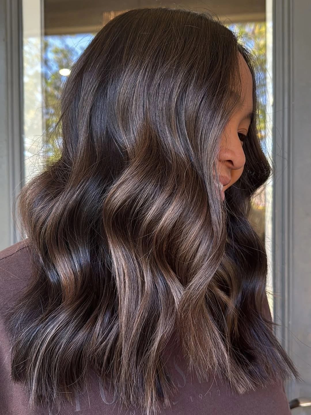 Short silver white wavy bob with blunt lower edge