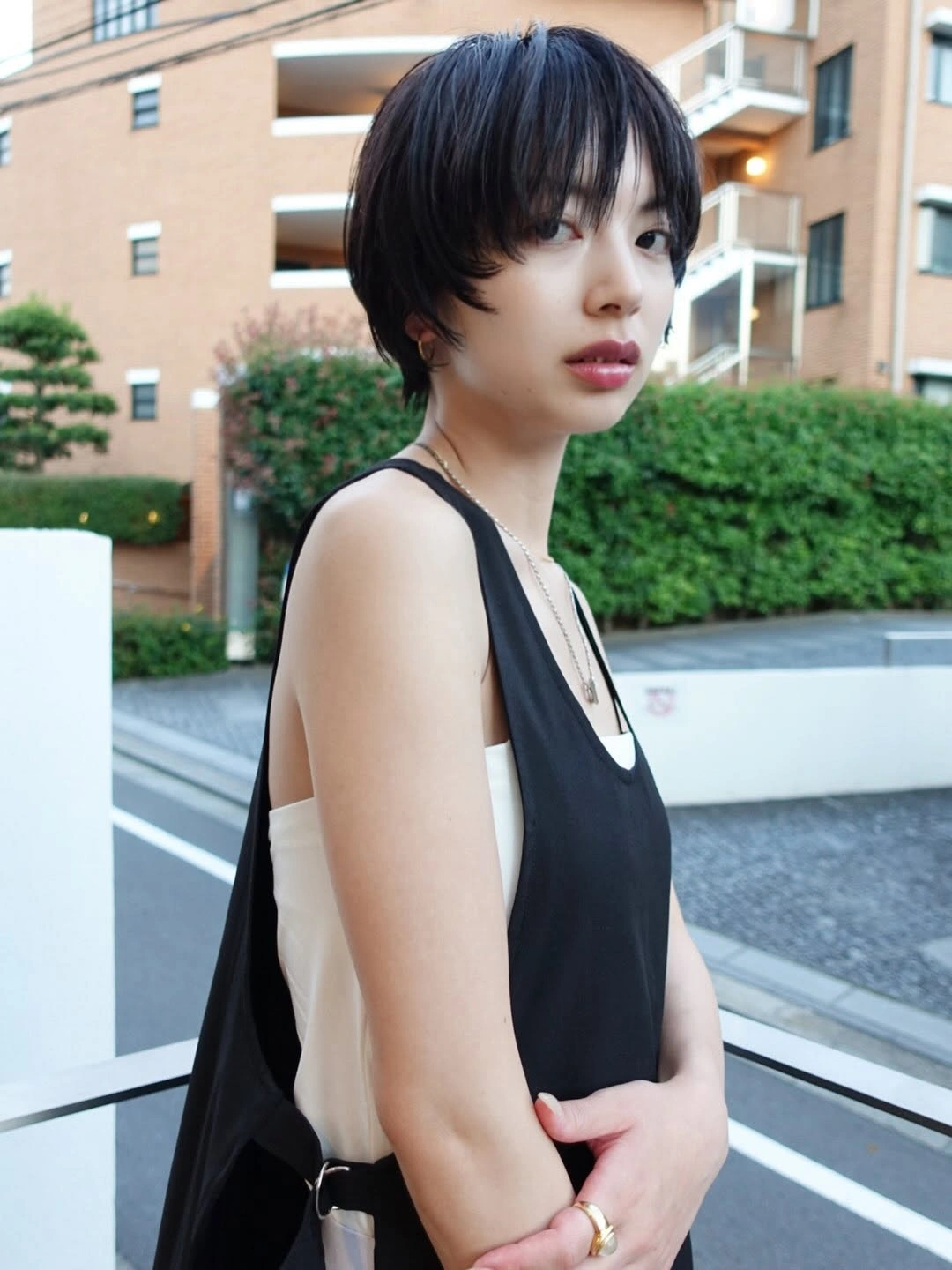 Short peach copper bob with visible blue gray side panel