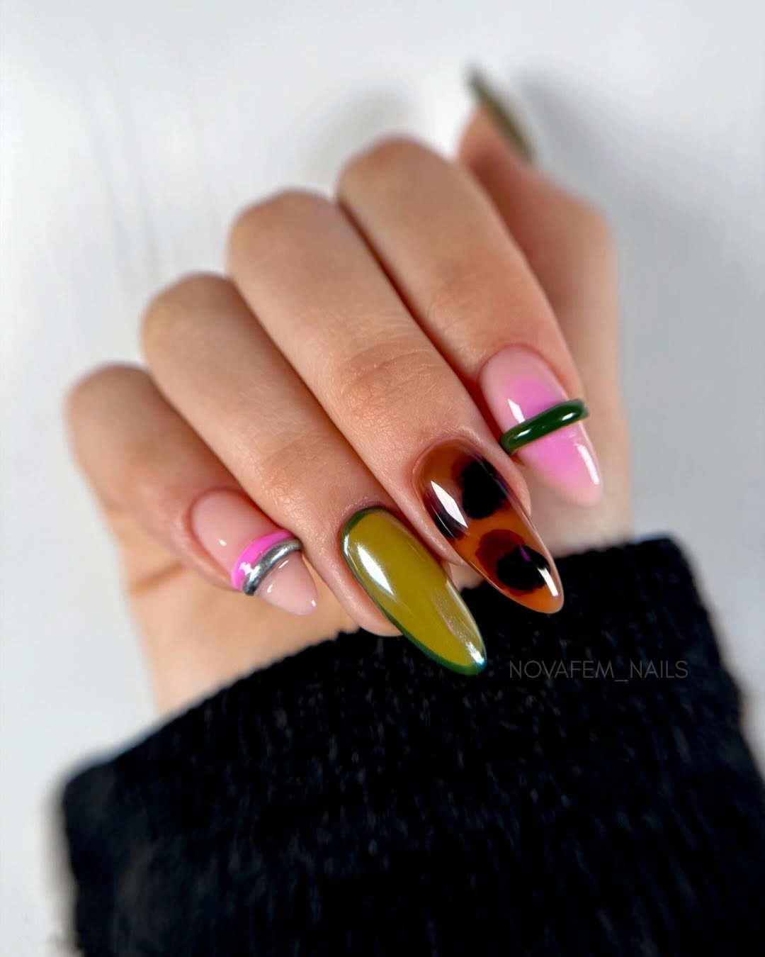 Short mixed nails with olive, amber-brown, pink, black, and green
