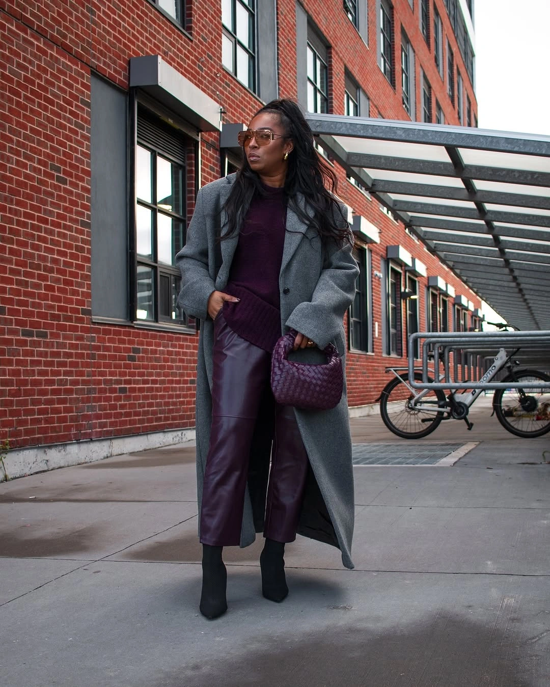 Gray long coat, burgundy top, plum pants, purple bag