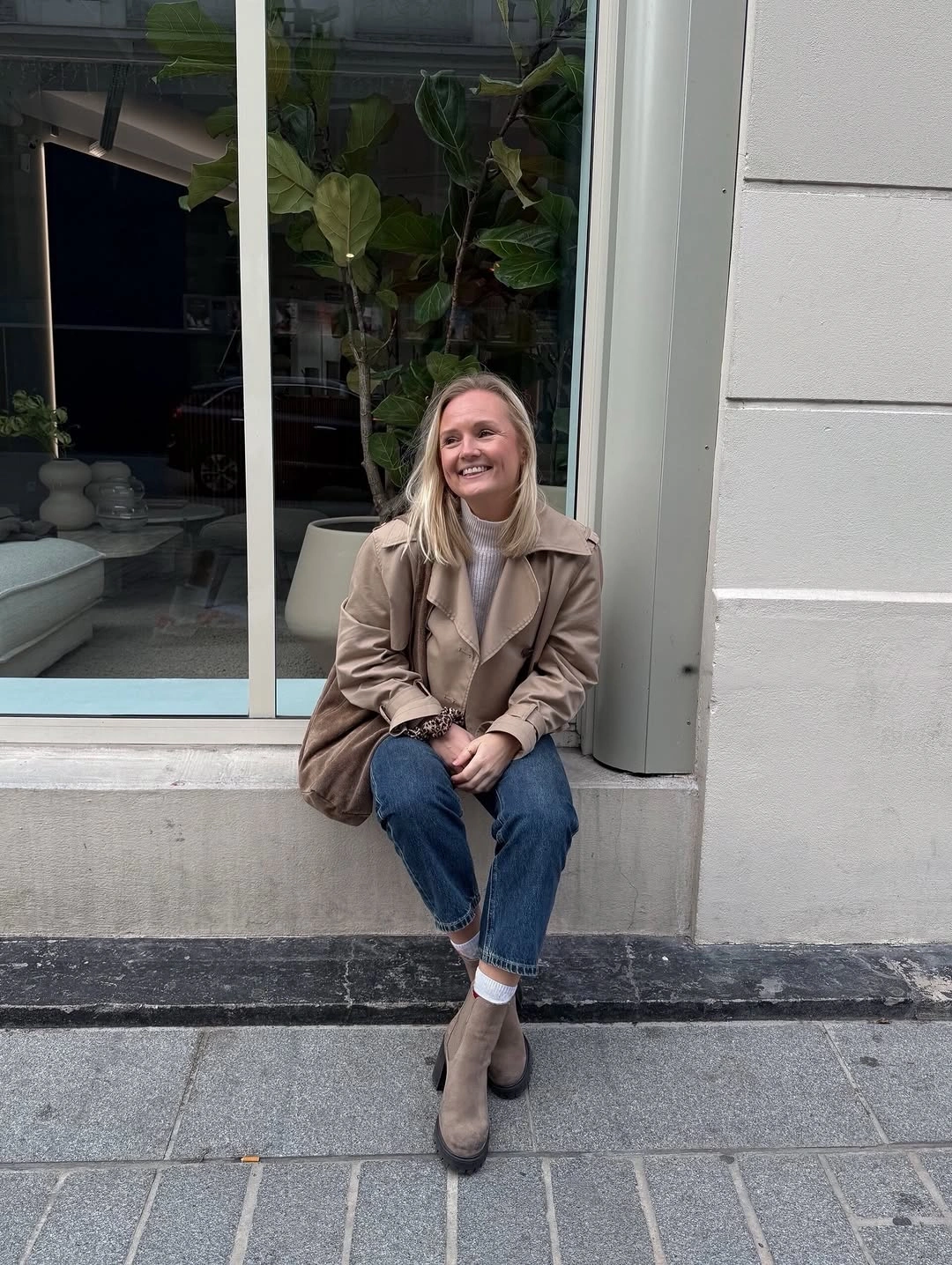 Beige jacket, light top, cropped jeans, socks, ankle boots