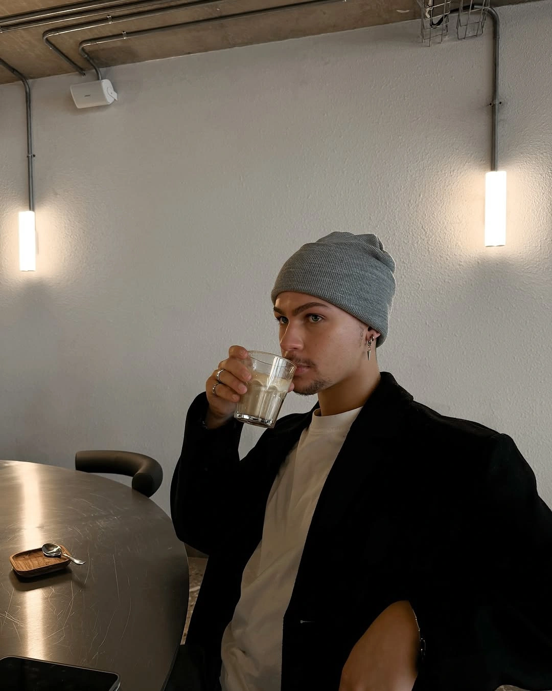 Gray beanie with black open layer and white top