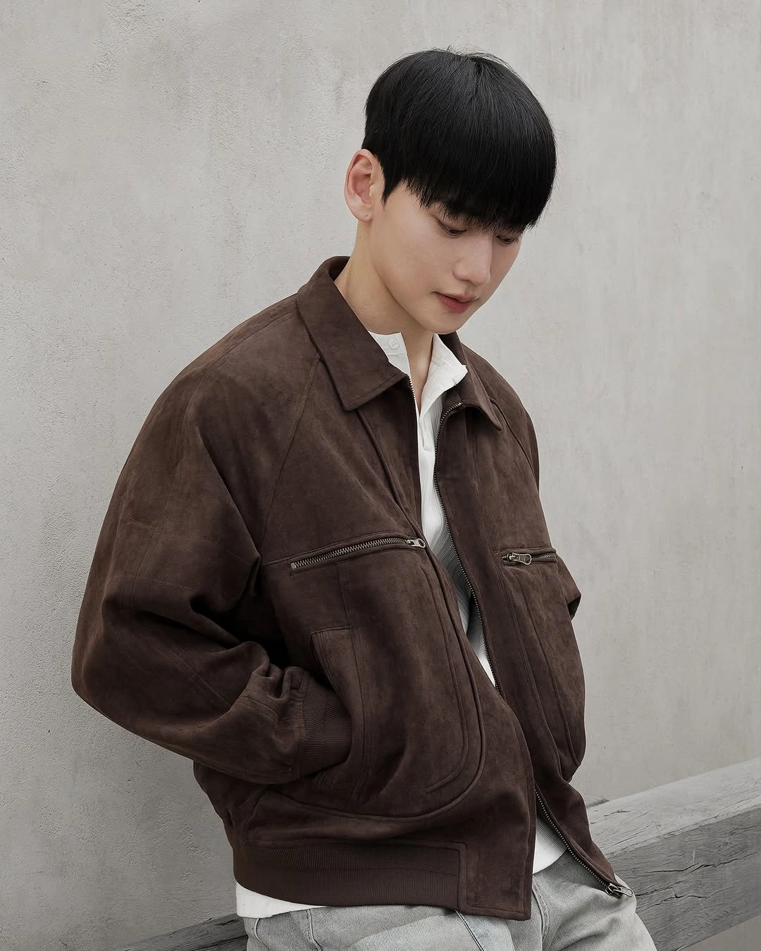 Dark brown zip jacket with cream wide trousers