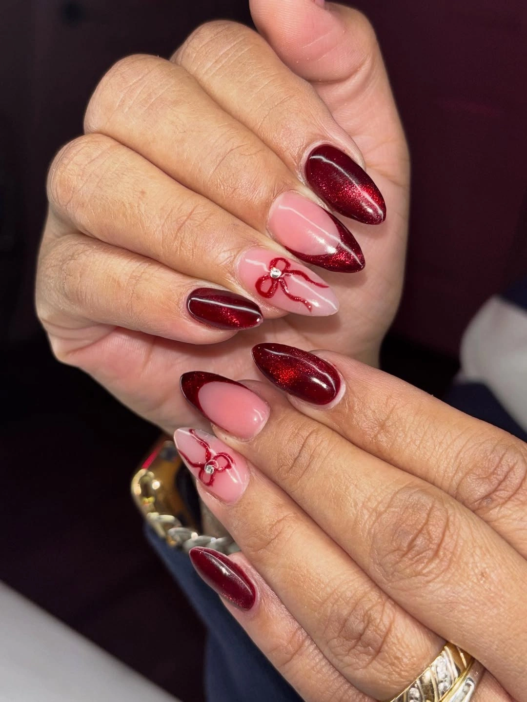 Almond wine red nails with pink tips and raised bows