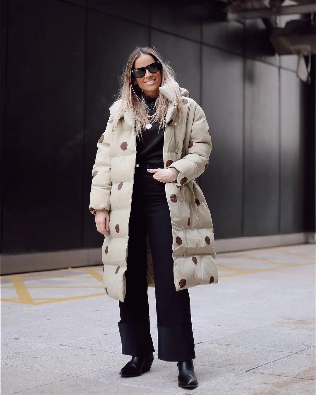 Cream long puffer with brown circular pattern