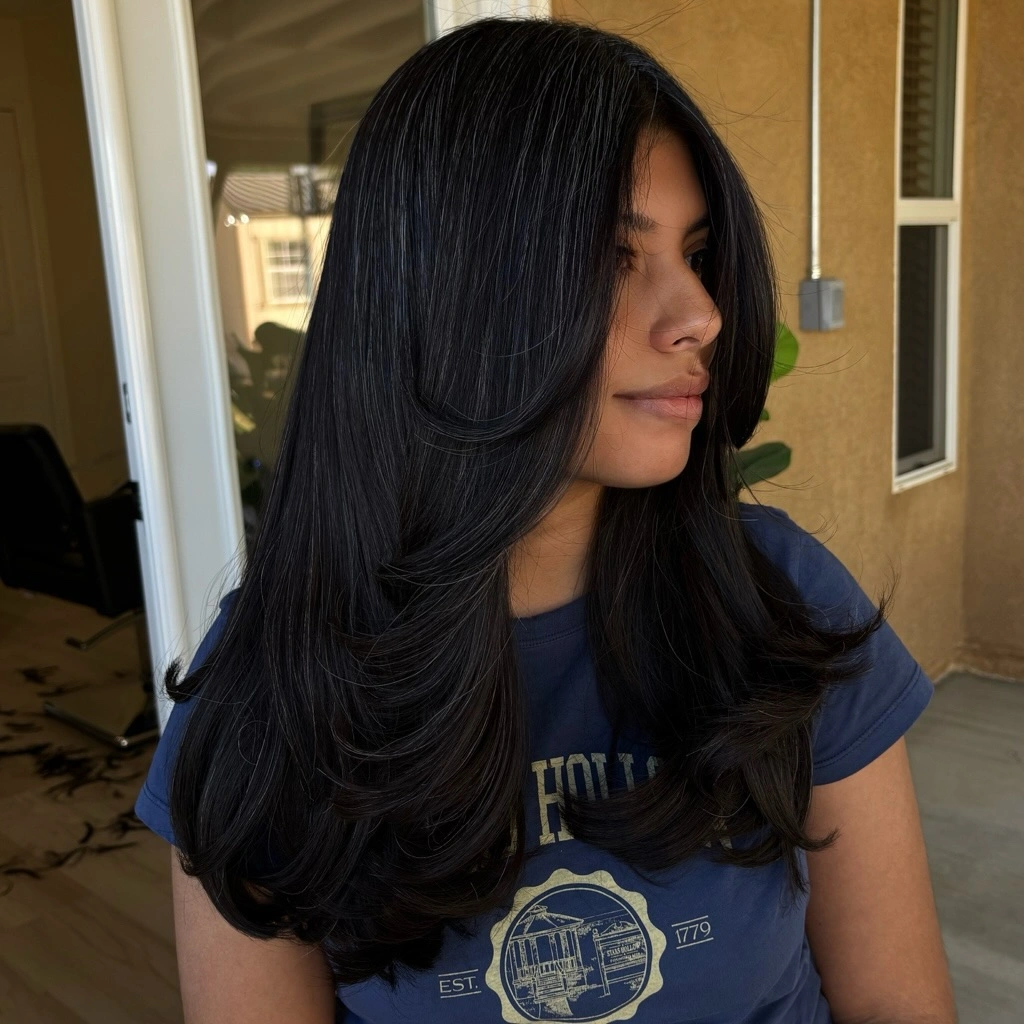 Long black layered hair with curtain-like front pieces
