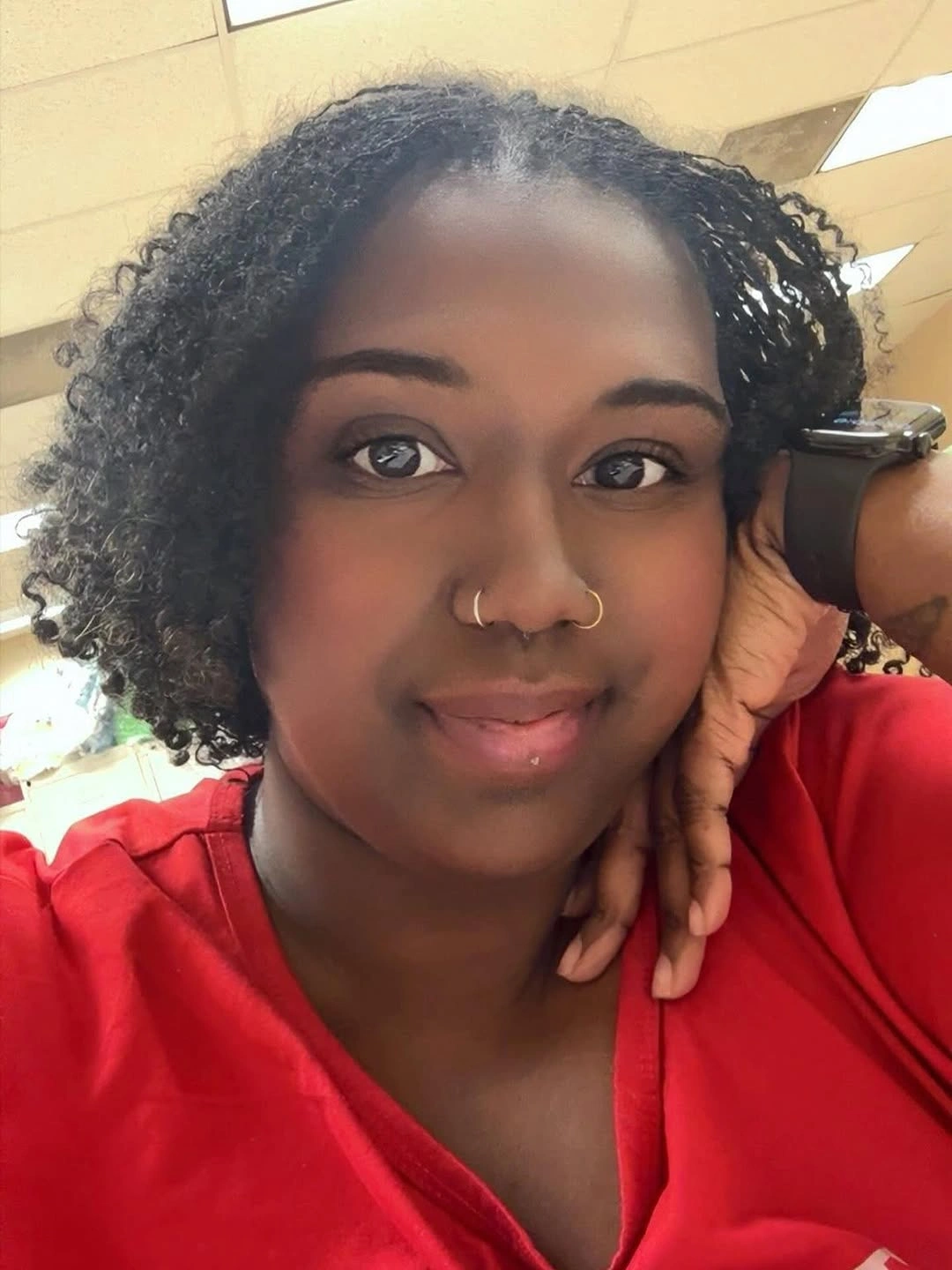 Short rounded black curls with soft uneven edge