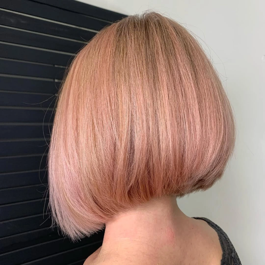 Pastel pink blunt bob from back with rounded hem