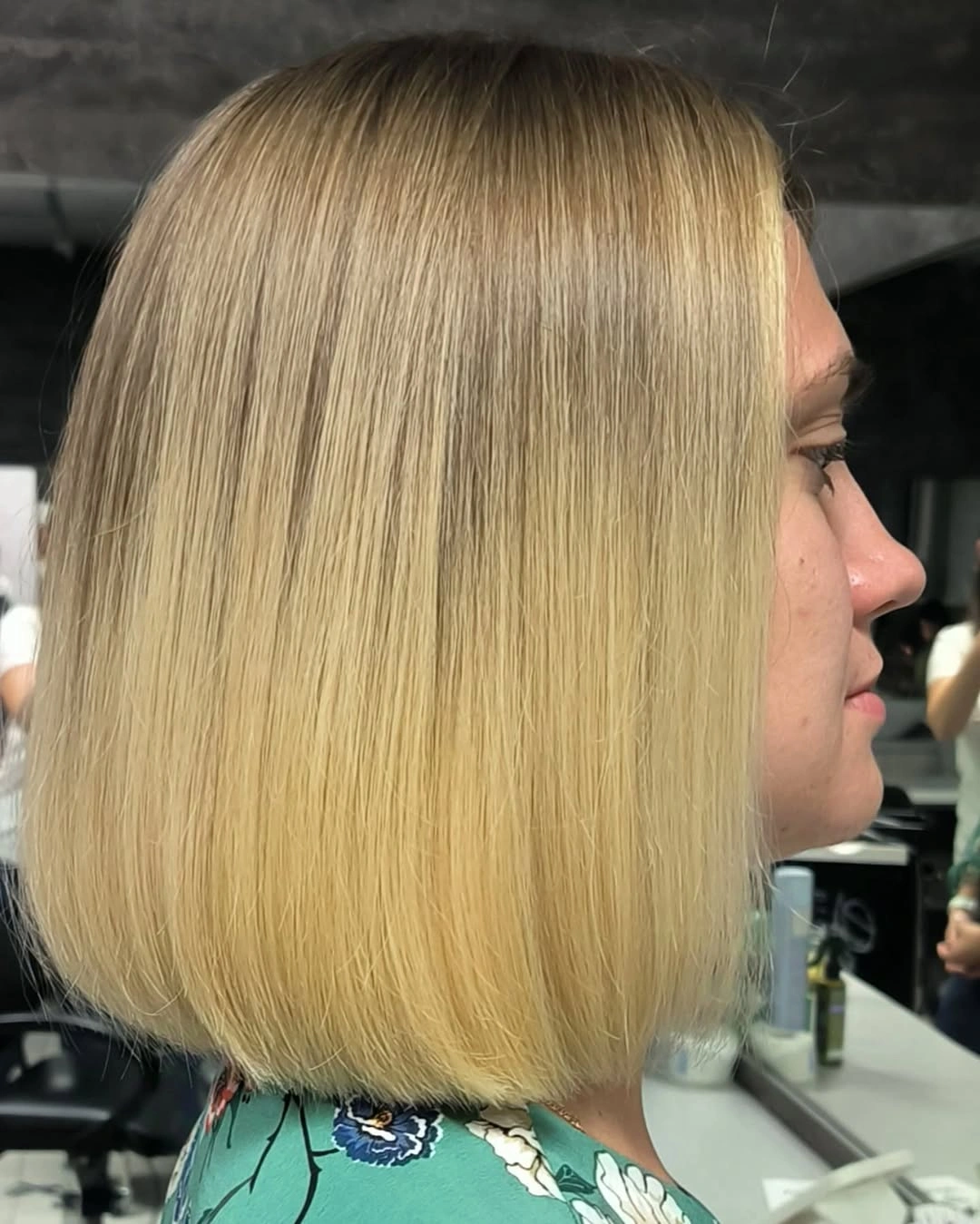 Pale blonde shoulder-grazing long bob with even edge