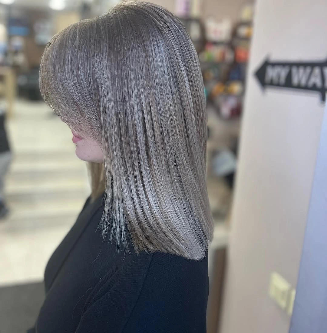 Silver gray straight hair with long side-swept front section