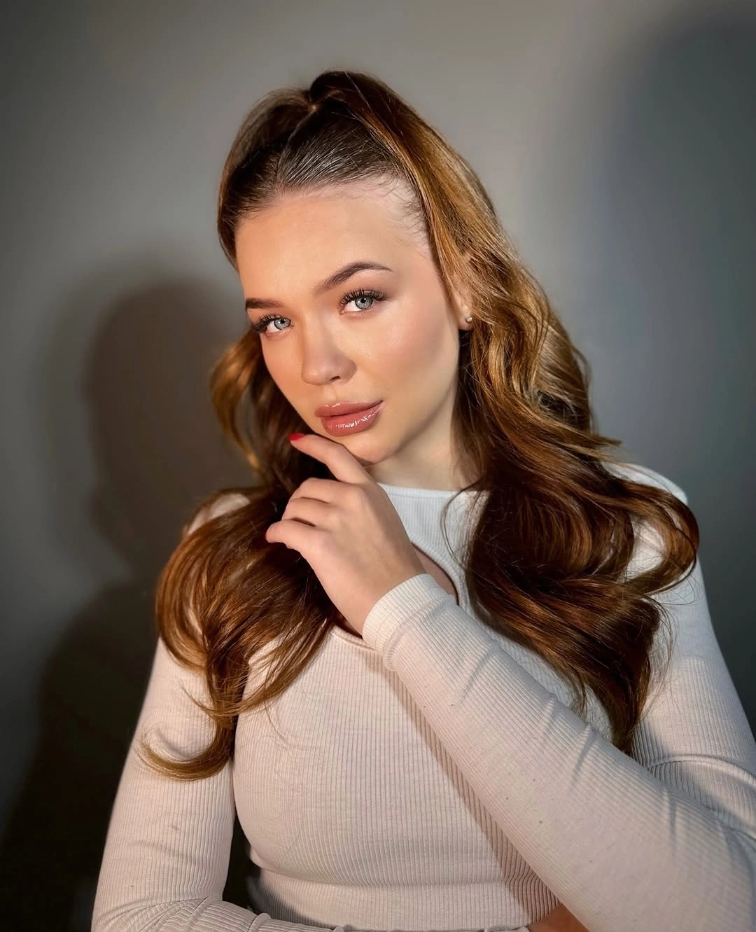 Long warm brown curls with high gathered crown section