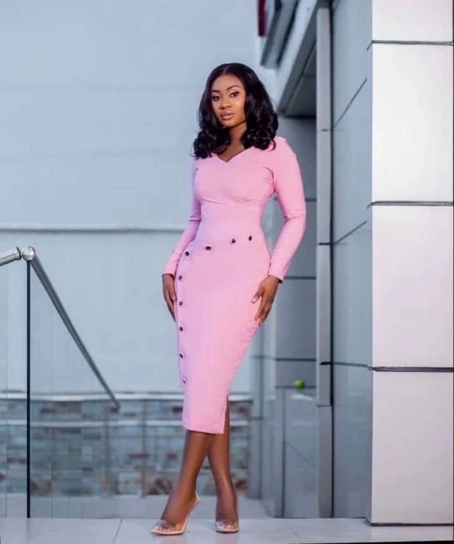 Pink long-sleeve midi dress with pale high heels