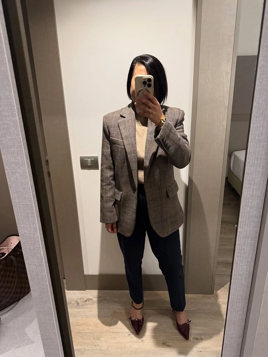 Checked blazer with dark tapered trousers and burgundy pointed flats