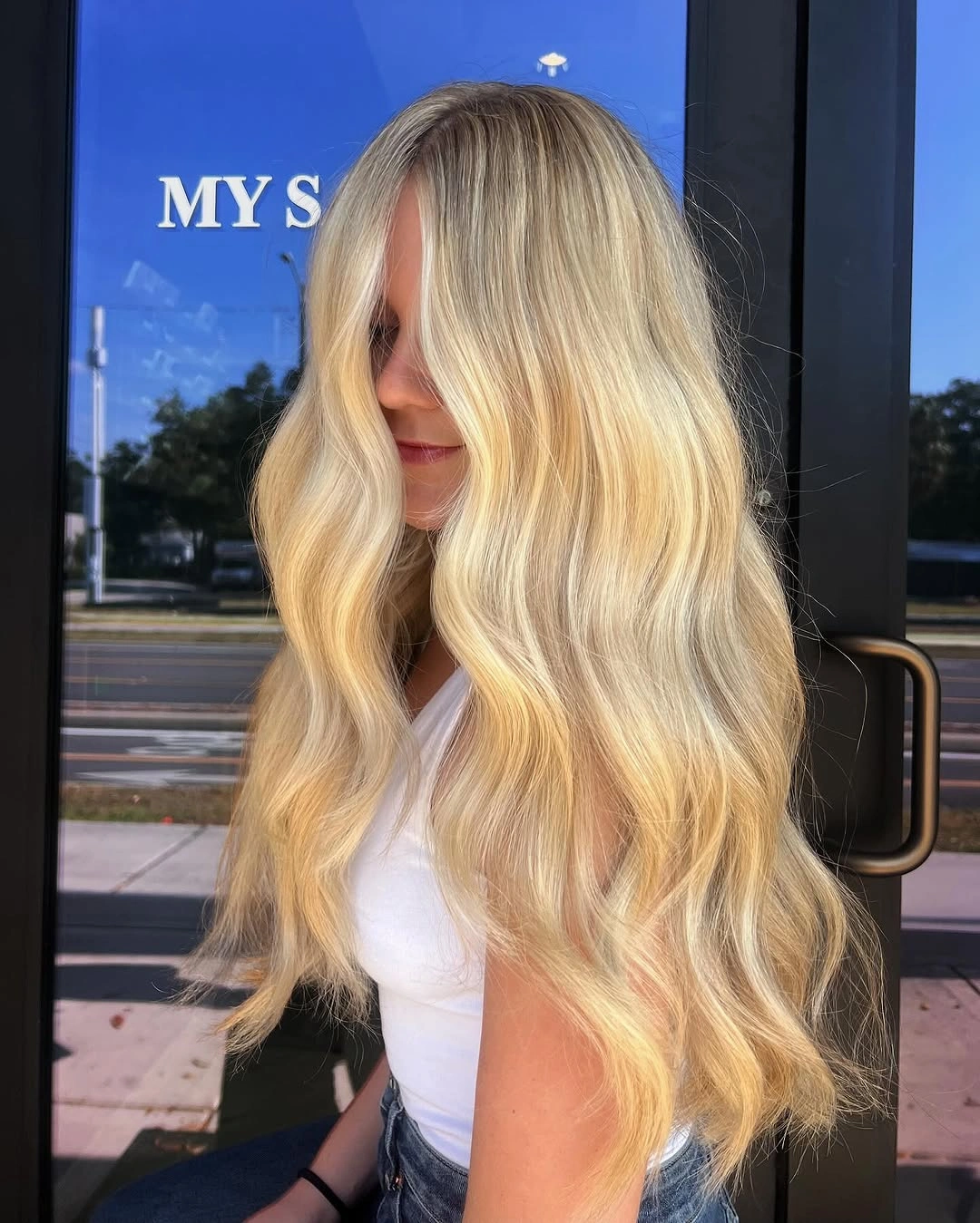 Long warm golden blonde waves with bright front pieces