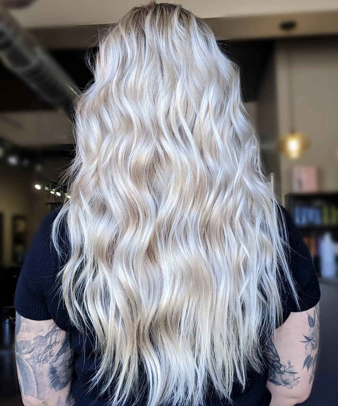 Long cool blonde waves with pale silver-white ribbons