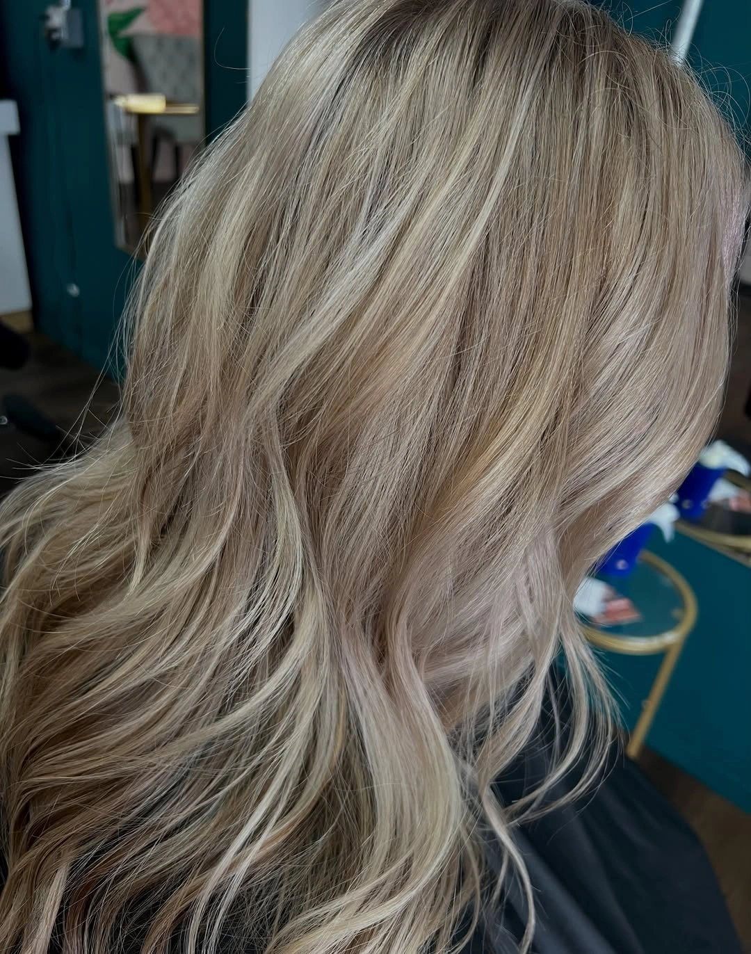 Ash beige blonde waves with lighter surface ribbons